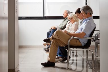 Waiting For Doctor In Hospital Lobby clipart