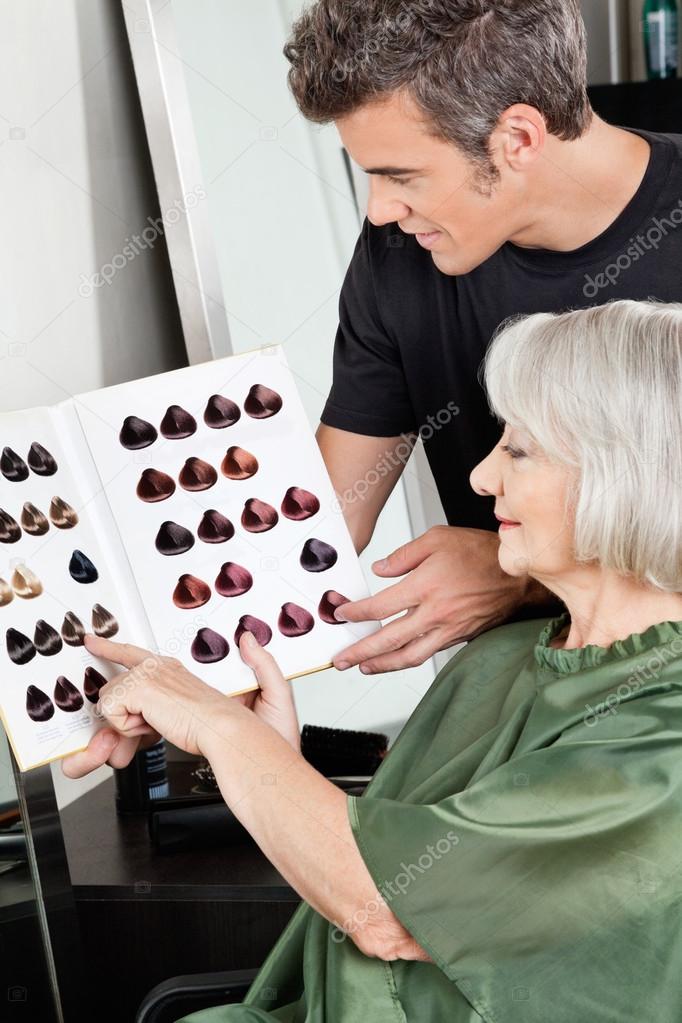 Client And Hairdresser Selecting Hair Color