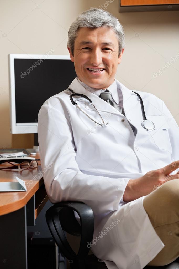 Happy Doctor In Clinic