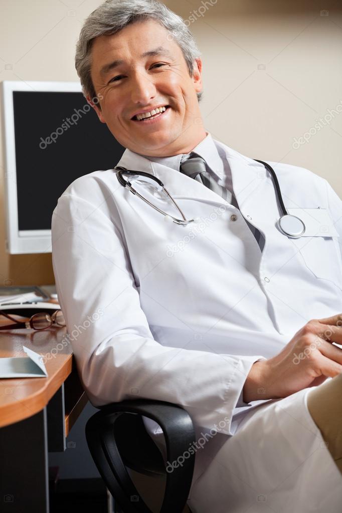 Happy Doctor In Clinic