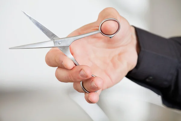 Male Hairdresser's Hand Holding Scissors — Stock Photo, Image