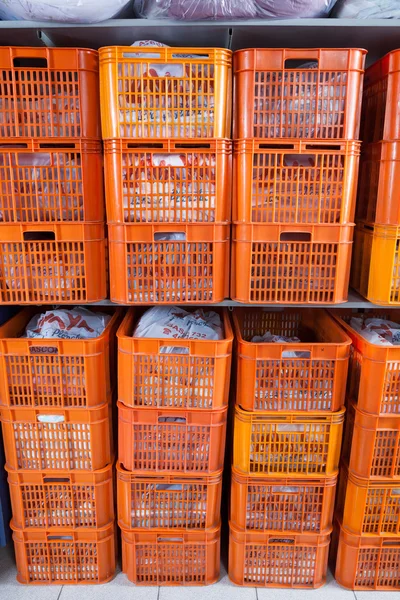 Laundry Baskets In Shelves — Stock Photo, Image