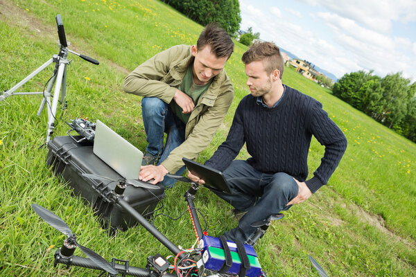Engineers Repairing UAV Helicopter