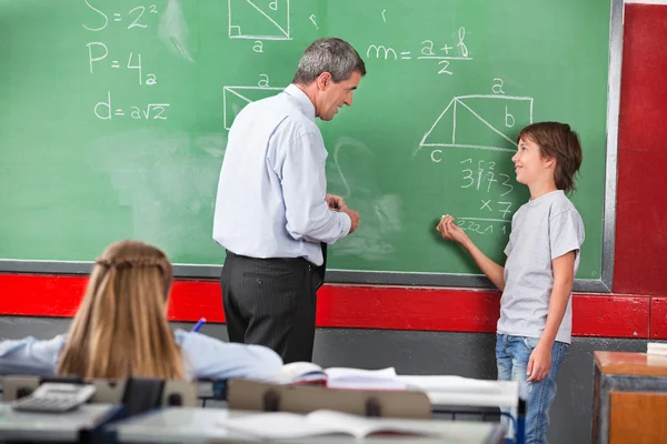 Schoolboy Asking Question To Teacher While Solving Mathematics — Stock Photo, Image