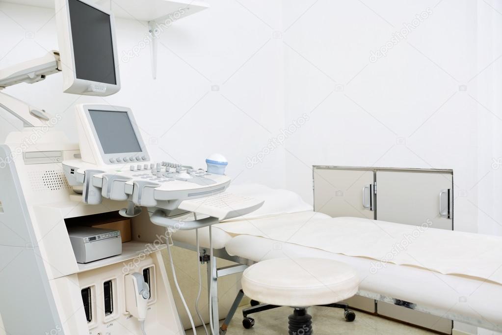 Medical Room With Ultrasound Machine In Clinic