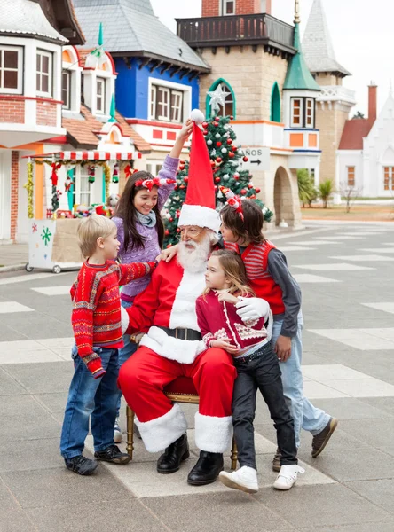 Happy Children And Santa Claus Royalty Free Stock Photos