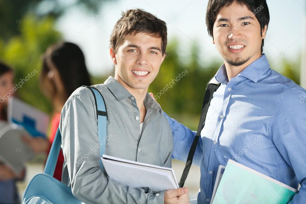 Male Friends Smiling On College Campus