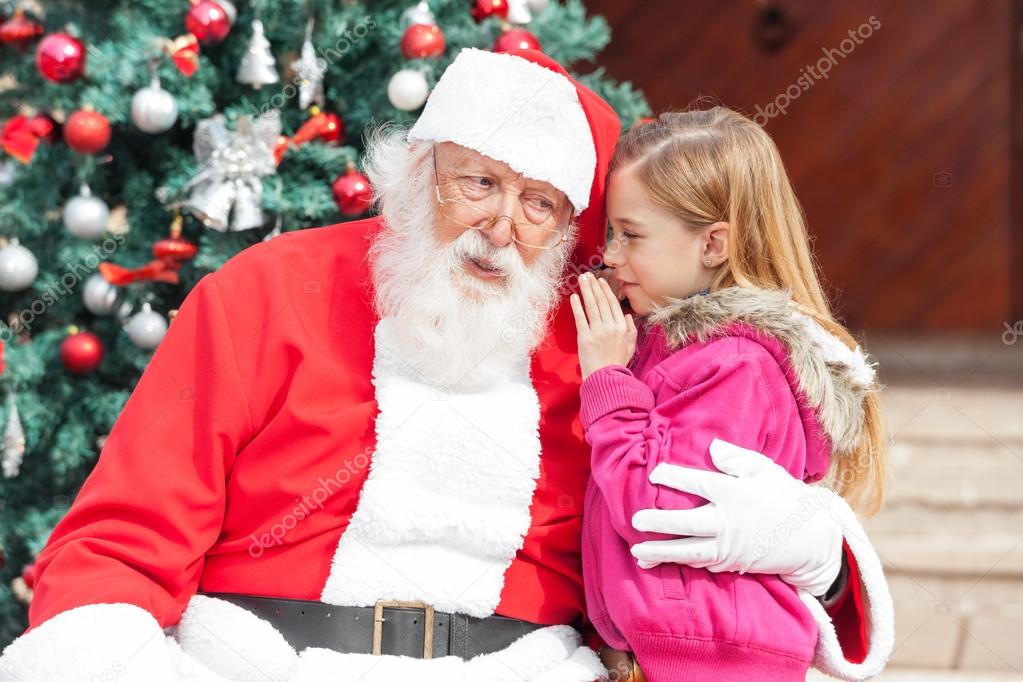 Girl Telling Wish In Santa Claus's Ear