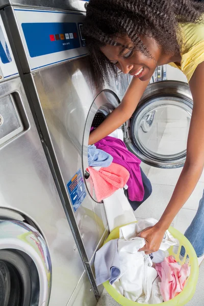 Woman Loading Dirty Clothes In Washing Machine — Stock Photo, Image