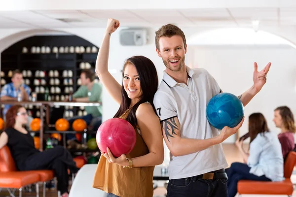 Excited Man And Woman Holding Bowling Balls — Stock Photo, Image