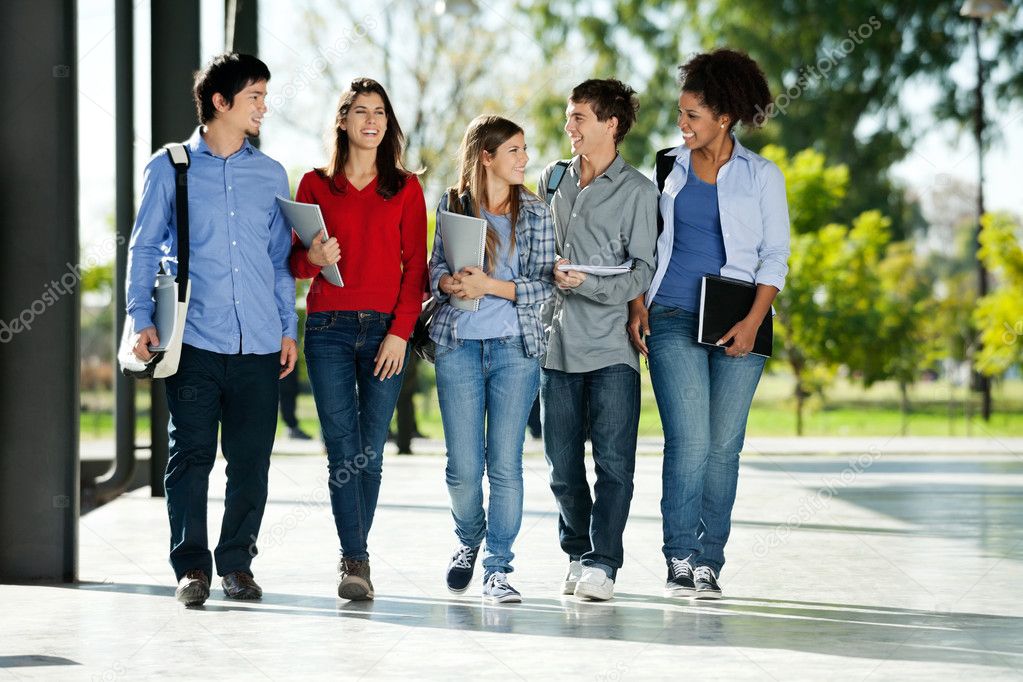 College Students Walking Together On Campus