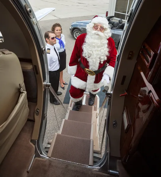 Retrato de Santa Boarding Private Jet — Fotografia de Stock