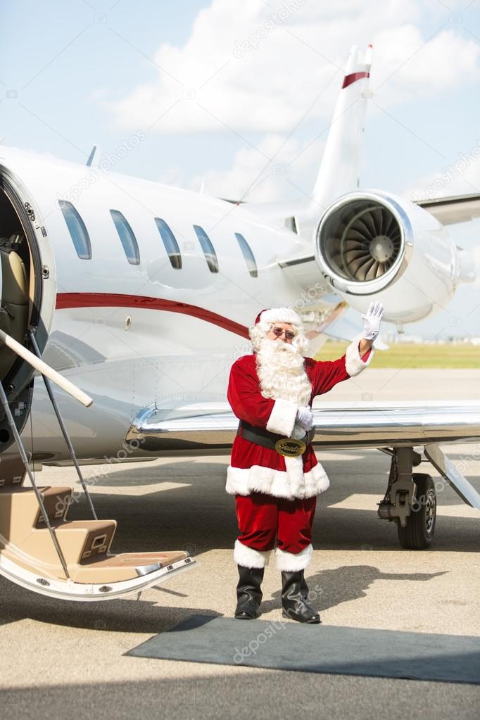 Santa Using Waving Against Private Jet