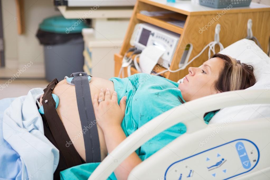 Birthing Mother with Electronic Fetal Monitor on Belly