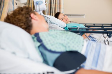Young Patient's Looking At Each In Hospital clipart