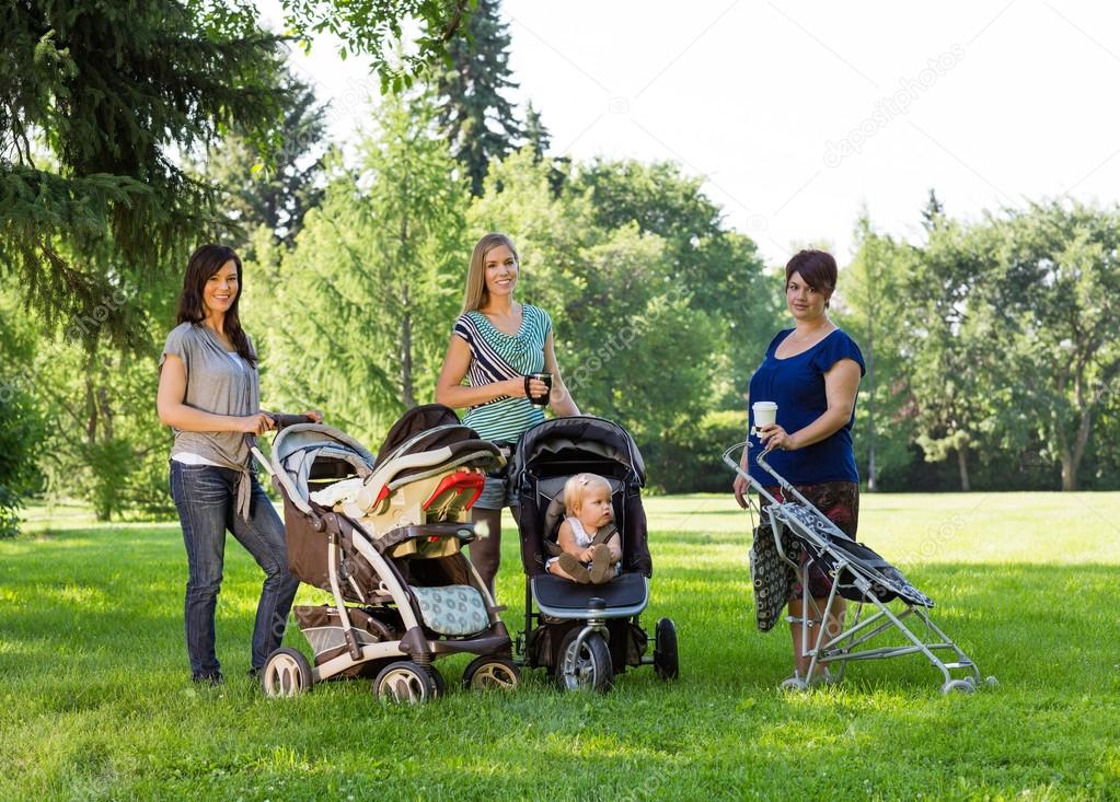 Mothers With Baby Carriages In Park
