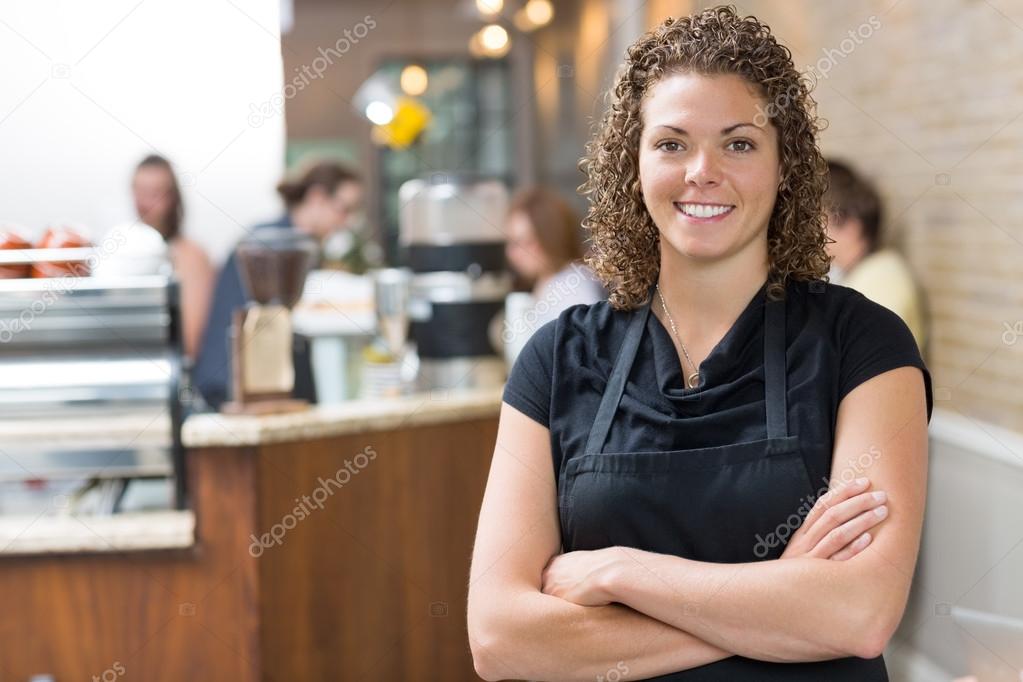 Happy Owner Standing Arms Crossed In cafe