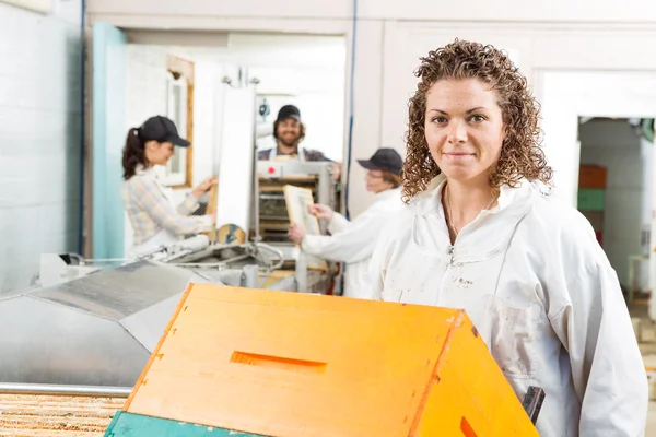 Female Beekeeper With Stacked Honeycomb Crates — Stock Photo, Image