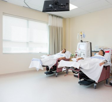 Patients Receiving Renal Dialysis In Hospital Room clipart