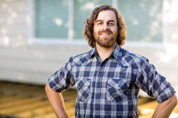 Confident Carpenter Standing At Construction Site — Stock Photo, Image