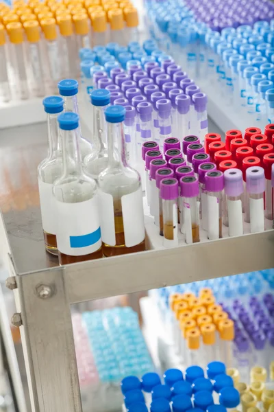 Test Tubes And Bottles On Trolley — Stock Photo, Image
