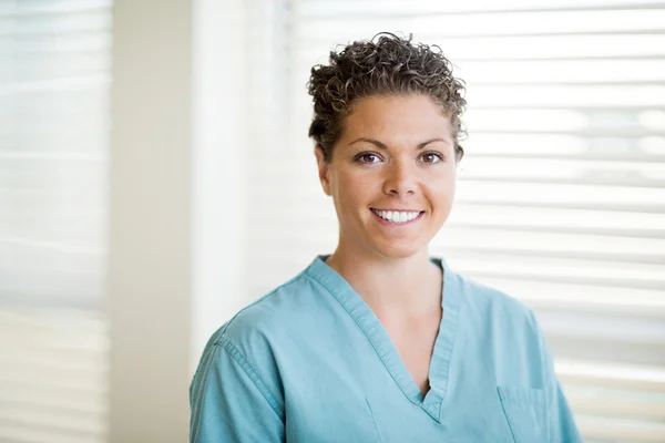 Happy Female Nurse In Scrubs — Stock Photo, Image