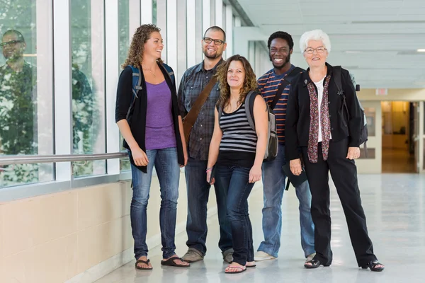 Happy Multiethnic University Students At Corridor — Stock Photo, Image