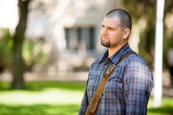 Thoughtful Student Standing At Campus — Stock Photo, Image