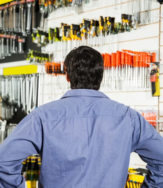 Rear View Of Customer Standing In Hardware Shop — Stock Photo, Image
