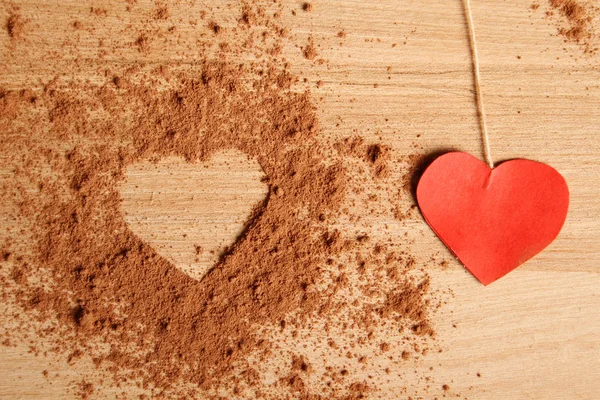 Heart shape made ??of cocoa — Stock Photo, Image