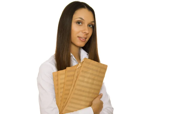 Jovem mulher segurando partituras — Fotografia de Stock