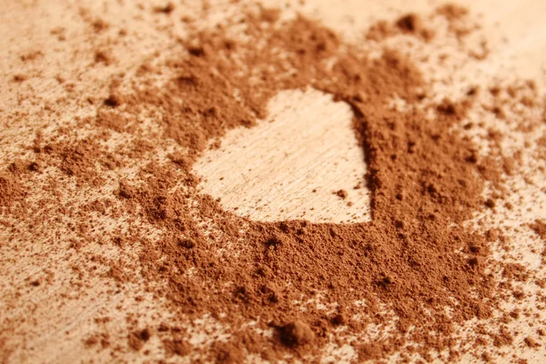 Heart shape made ??of cocoa — Stock Photo, Image