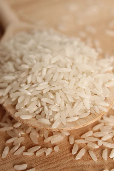 Rice in spoon — Stock Photo, Image