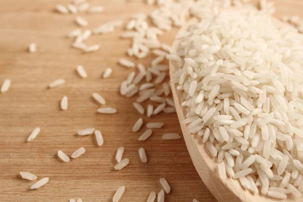 Rice in spoon — Stock Photo, Image