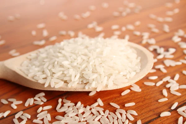 Rice in spoon — Stock Photo, Image