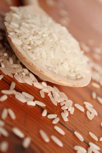 Rice in spoon — Stock Photo, Image