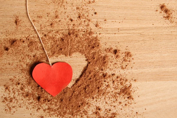 Heart shape made ??of cocoa — Stock Photo, Image