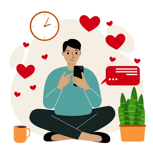 Conectados namoro, amor, conceito de romance. Homem sorridente está sentado de pernas cruzadas com um telefone celular com corações voadores ao redor —  Vetores de Stock