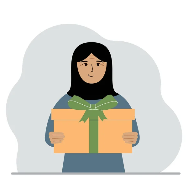 Χαρούμενη Μουσουλμάνα Κρατάει Ένα Μεγάλο Κουτί Δώρου Ένα Τόξο Στα — Διανυσματικό Αρχείο