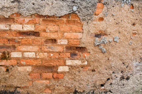 Damaged brick wall — Stock Photo, Image