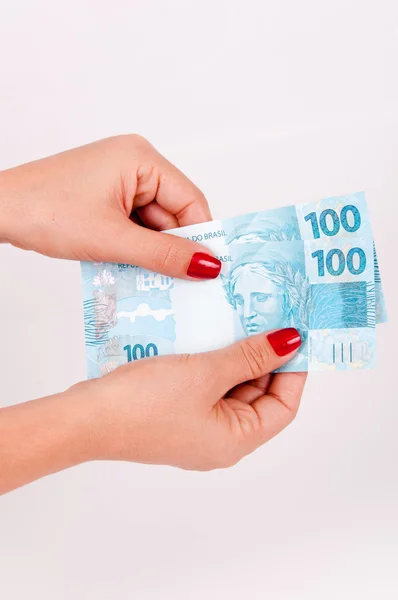 Geld in de handen — Stockfoto