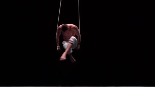 Muscular Circus Artist Perform Aerial Straps Black Background Movement Strength — Video Stock