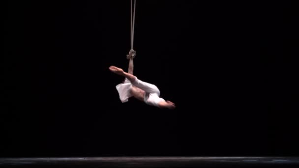 Muscular Circus Artist Perform Aerial Straps Black Background Concept Originality — ストック動画