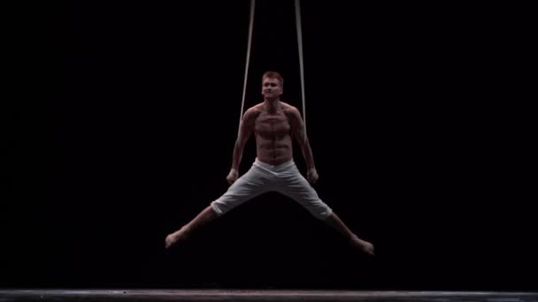 Muscular Circus Artist Perform Aerial Straps Black Background Movement Strength — Vídeos de Stock