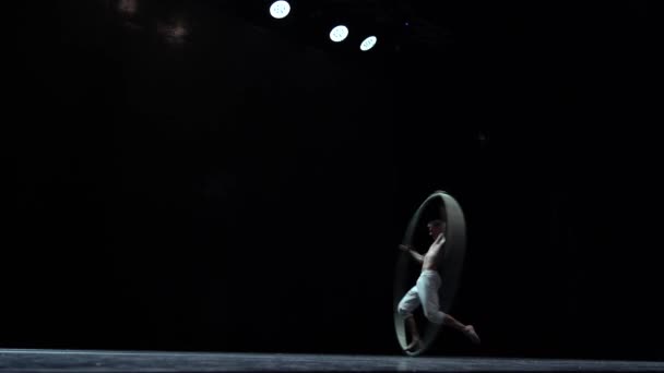 Muscular Circus Artist Perform Cyr Wheel Black Background Concept Willpower — Stock video