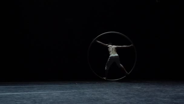 Muscular Circus Artist Perform Cyr Wheel Black Background Concept Willpower — Stockvideo