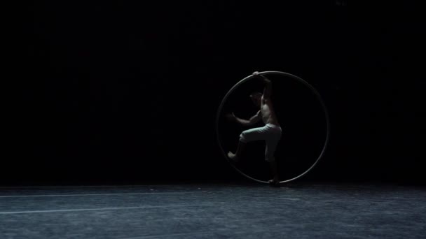 Muscular Circus Artist Perform Cyr Wheel Black Background Stage Slow — Stockvideo