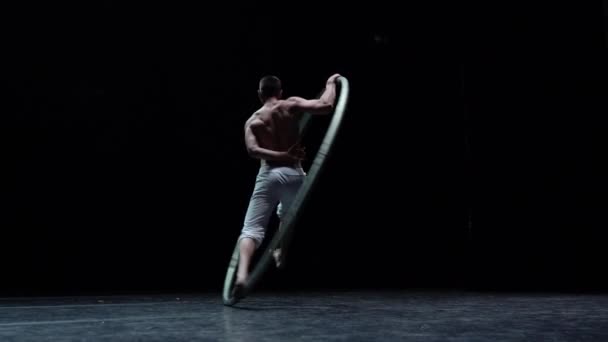 Muscular Circus Artist Perform Cyr Wheel Black Background Concept Originality — Video
