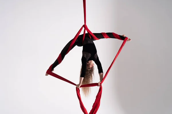 Flexible Circus Artist Performs Aerial Silk White Background Concept Willpower — Foto Stock