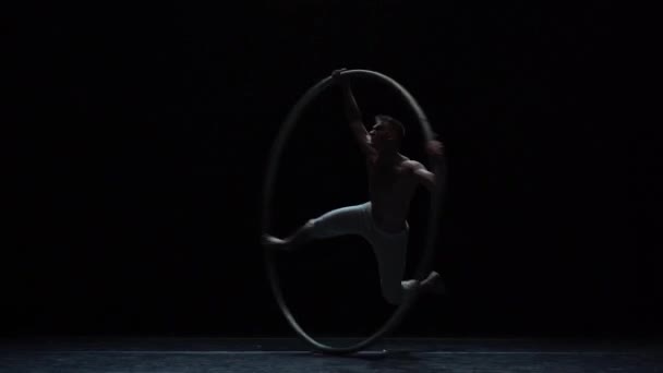 Muscular Circus Artist Perform Cyr Wheel Black Background Stage Slow — стоковое видео